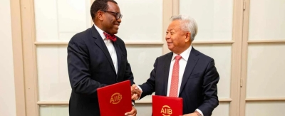 "The President of the African Development Bank Group, Akinwumi Adesina (left), and the President of the AIIB, Jin Liqun, shake hands after signing a renewed memorandum of understanding between their institutions for sustainable economic development in Africa."

